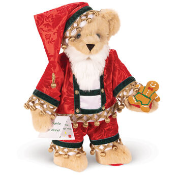 15" Limited Edition Christmas Cookie Santa Bear - Standing jointed buttercream bear with blue eyes wearing satin pajamas, a matching nightcap, a white beard, and glasses and holding a cookies and list.